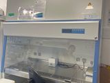 a lab with a desk and a chair in it