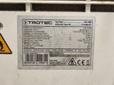 a label on the back of a machine that says trotec