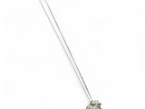 a white necklace with an elephant pendant on a chain