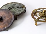 two small metal objects sitting next to each other