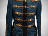 an image of a blue jacket with gold buttons on a mannequin
