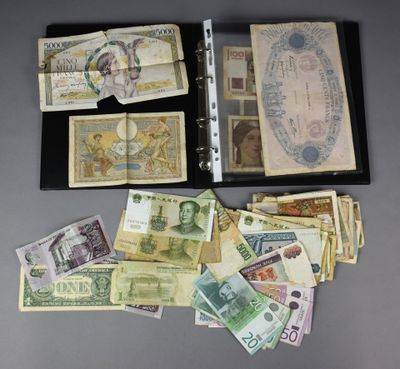 an assortment of foreign currency including one hundred and one hundred dollars