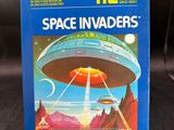 a box with a picture of a space invader on it