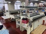 a machine that is in the middle of a factory