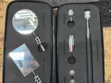 a black case with tools in it sitting on a table