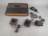a game console and other electronics on a table