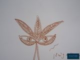 drawing of a marijuana leaf with eyes drawn on it