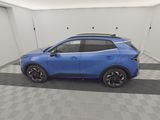 a blue suv parked in a garage with a checkered floor