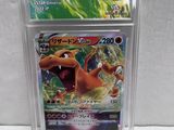 a close up of a pokemon card in a clear plastic holder