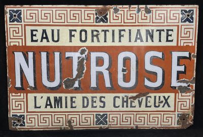 a sign that says nutrose on it on a black background