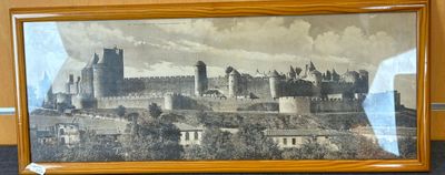 une photo d'une photo représentant un château, dans un cadre