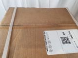 a cardboard box with a qr code on it sitting on a table