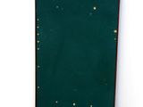 a picture of a green door in the corner of a room