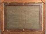 an old wooden picture frame with a brown linen backing