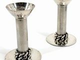 pair of silver plated candlesticks with twisted rope handles