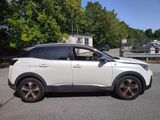 a white suv that is parked in the parking lot
