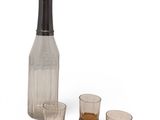 an image of a bottle of liquor and two shot glasses on a white background