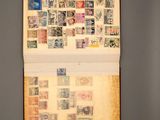 a picture of a book with a lot of stamps on it