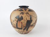 un vase avec l'image d'un homme et d'une femme dessus