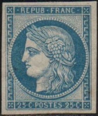 a blue and white stamp with a woman ' s face on it