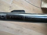 a close up of a bike handle on a wooden floor