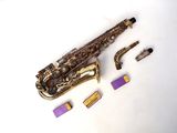 a saxophone that is laying on a table