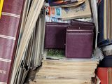a box full of books and papers sitting on a table