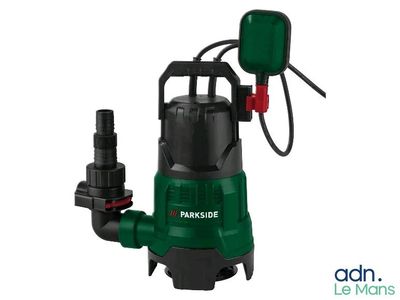 a close up of a green and black pump on a white background