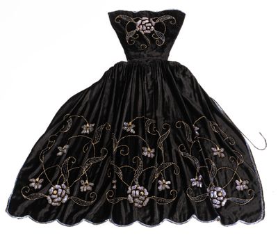 an image of a black dress with flowers on it on a white background