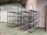 an image of a large warehouse with a lot of shelves