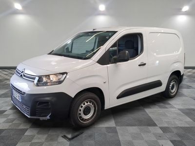 a picture of a white van parked in a room