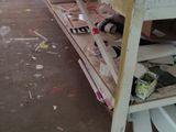 a workbench that has a lot of tools on it