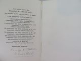 an open book with a handwritten poem on it