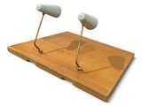 two lamps that are on top of a wooden board