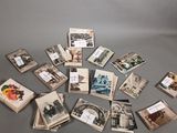 a lot of old postcards on the table