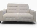 an image of a couch that is sitting on a white surface