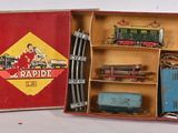 a box with a train set in it on a table