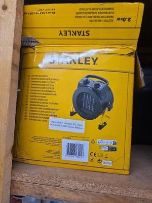 une boîte jaune sur laquelle figure une image en noir et blanc