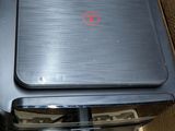 a box with a laptop in it and a mouse on top of it