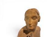 statue of a woman holding a cat on a white background
