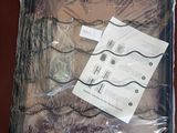 a plastic bag with a pair of scissors in it