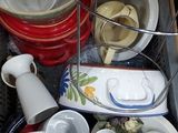 a tray full of dishes and cups on the counter