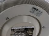 a close up view of a ceiling fan with the light on