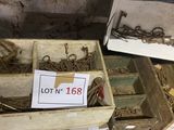 many different types of metal items in a box