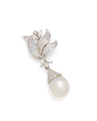 a white pearl and diamond broochle