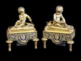 pair of antique brass figurines of a boy and a girl sitting on a bench