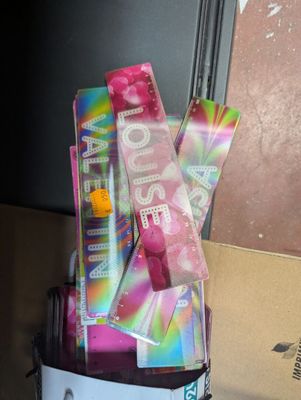 a box of toothbrushes and toothpaste sitting on a table