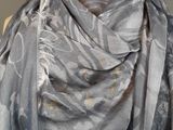 grey scarf with a floral design on it on a mannequin mannequin mannequin mannequin mannequin mannequin mannequin mann