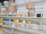 many shelves that have various items on them in the store