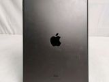 an apple ipad is sitting on a table with a white background